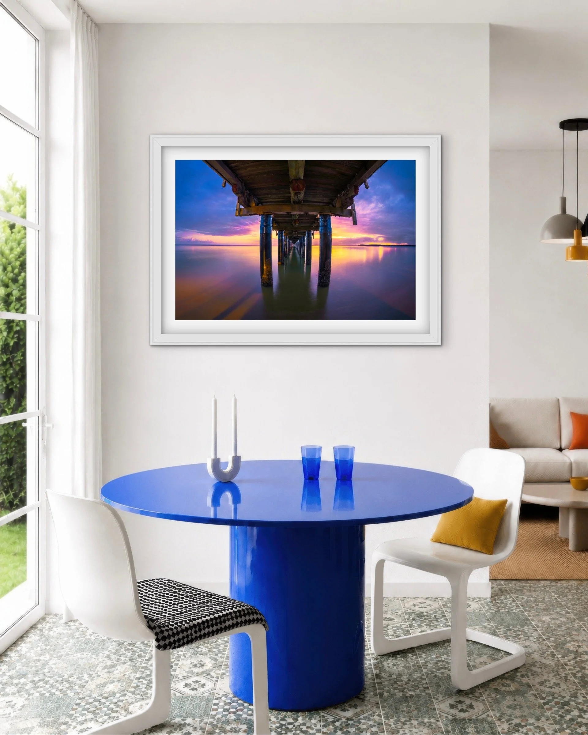 Room mock-up showing Urangan Pier at Dusk as framed wall art.