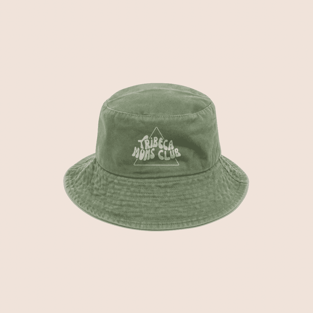 A green bucket hat with the embroidered logo