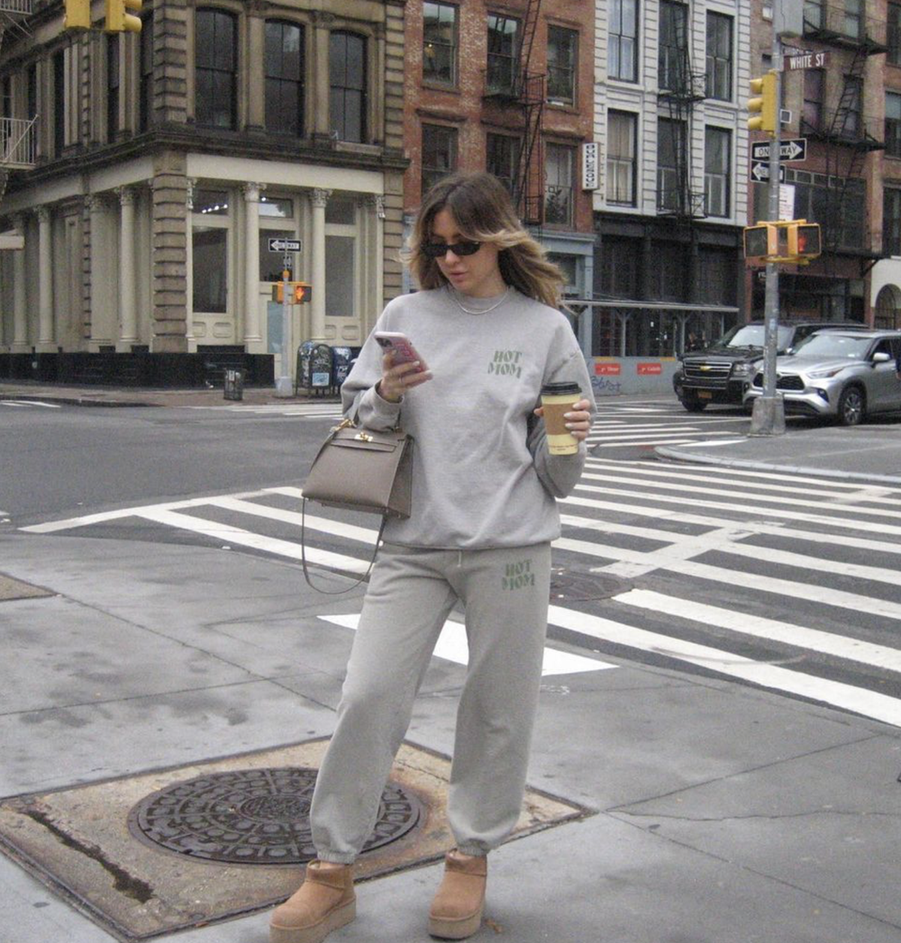 The heart sweatsuit from the front, crossing the street