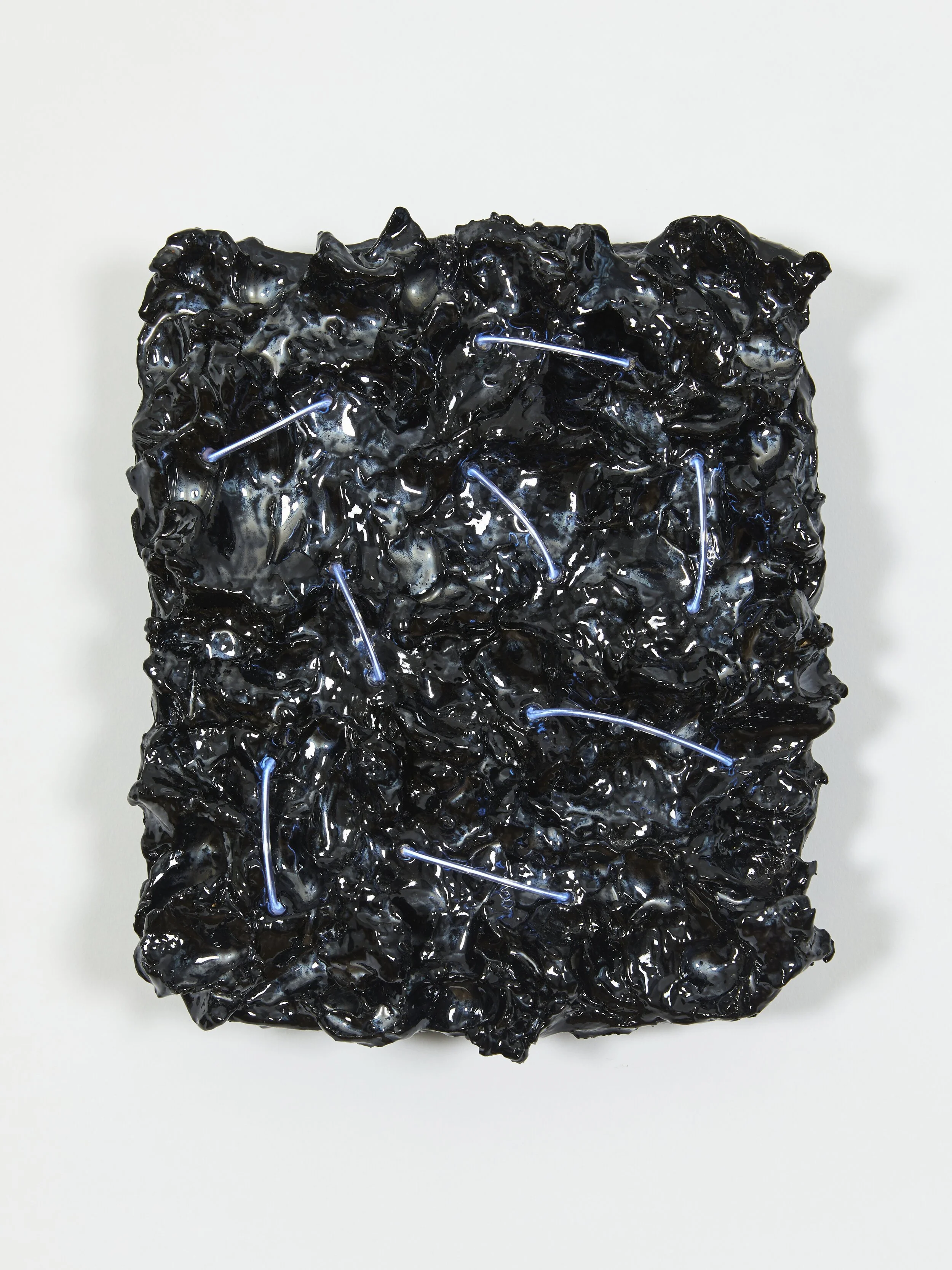 Sean Wadey - Enceladus #2,
Glazed stoneware and battery-operated LED. 21x24cm, 2019.