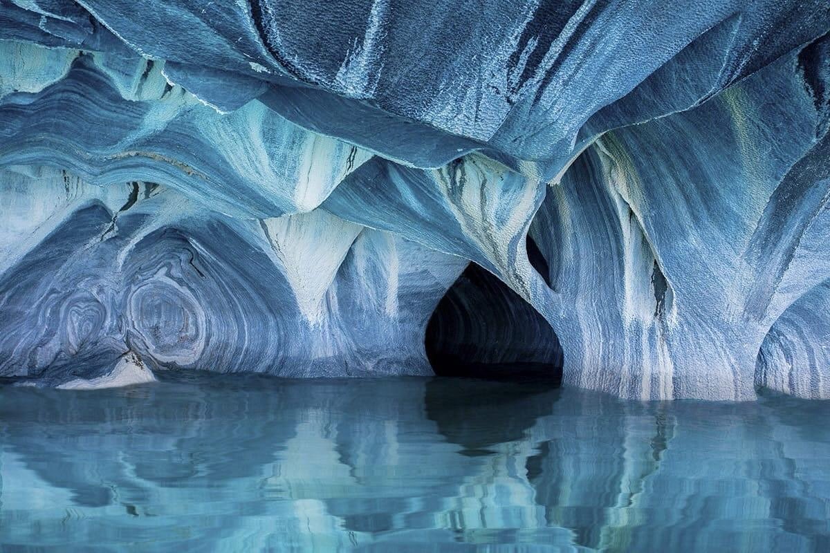 The Marble Caves in Patagonia, are 6,200 years old &mdash; practically newborns in geological time. Formed slowly by waves carving through stone, they emerged around the same period humans were building the world&rsquo;s earliest cities.

📸 &lsquo;N