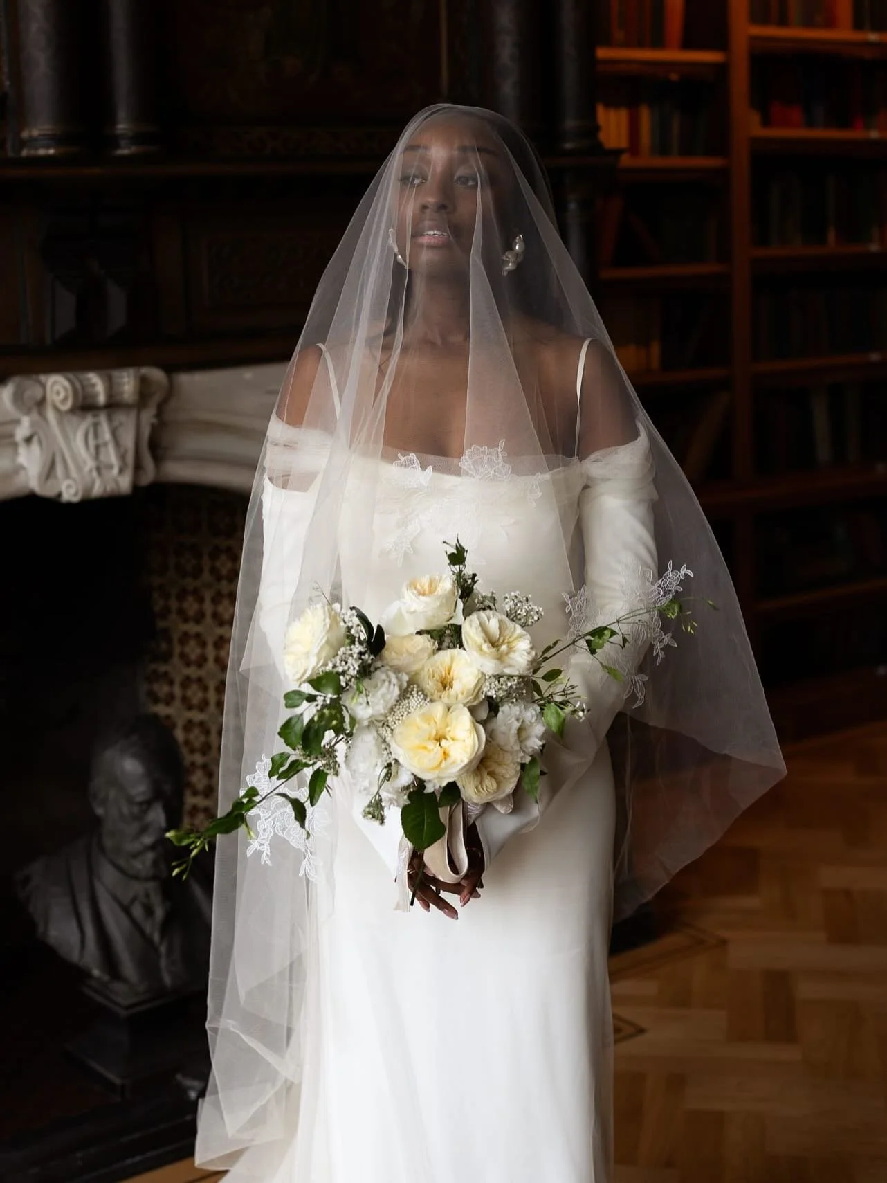 Bespoke veil for my beautiful bride Alice. She chose a dark ivory tulle with delicate floral appliqu&eacute;s to match her @daniellefrankelstudio dress.
Seeing her wearing her custom veil absolutely made my day 🤍