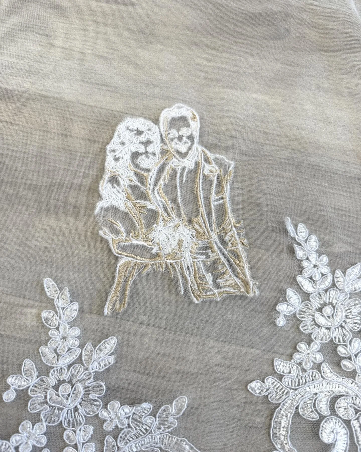 Some people never stop walking beside us 🤍

This custom veil was created for a bride who wanted her parents with her on her wedding day. We carefully embroidered their wedding portrait into her veil so they could walk beside her in the most meaningf