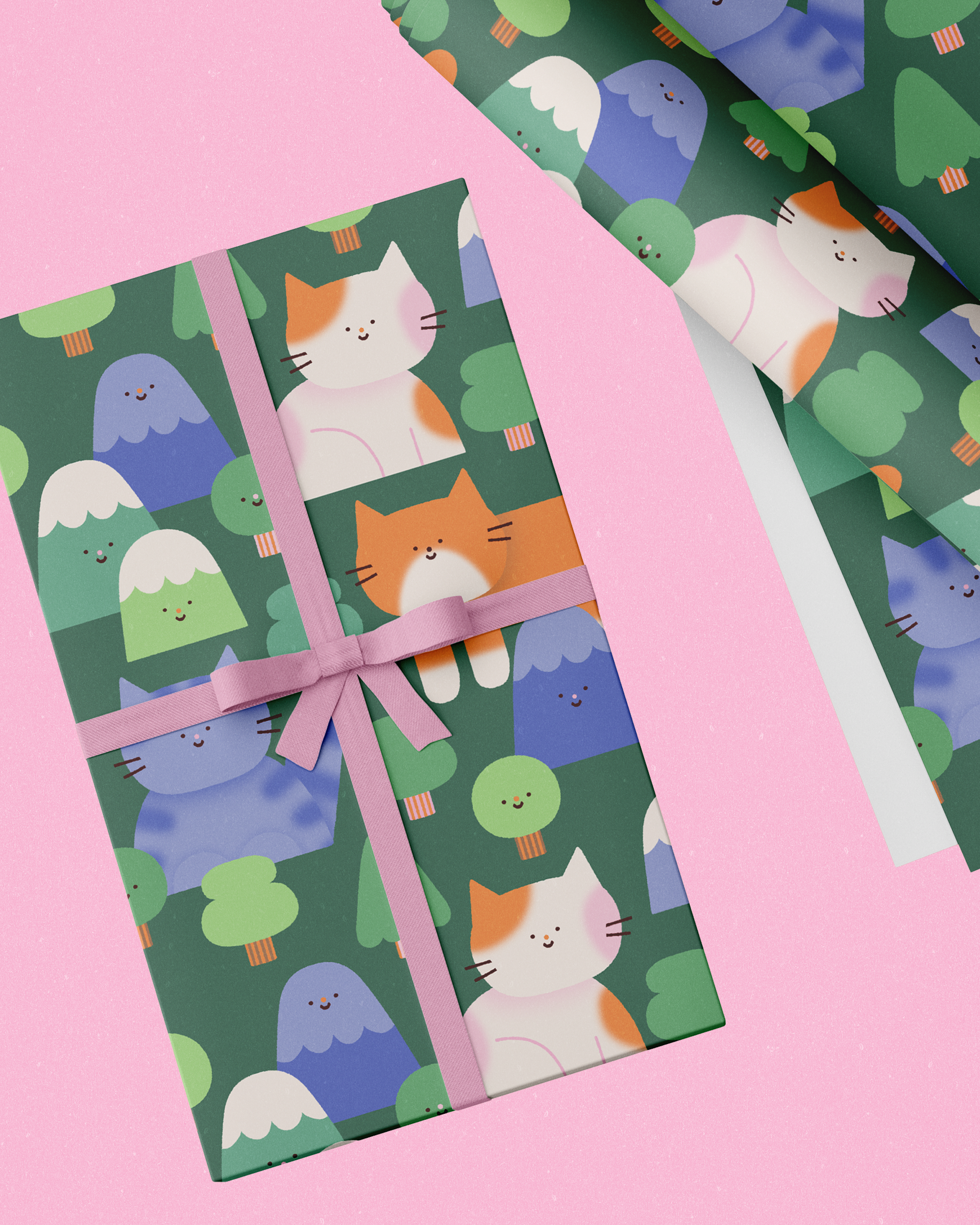 Close-up of gift boxes wrapped with pink and decorated with a pattern of cute cartoon cats, clouds, and trees, tied with pink ribbons, placed on a pink textured surface.