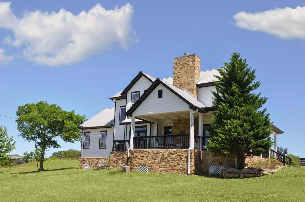 back view of the rental luxury house at the Blanco River Resort in Blanco, Texas.
