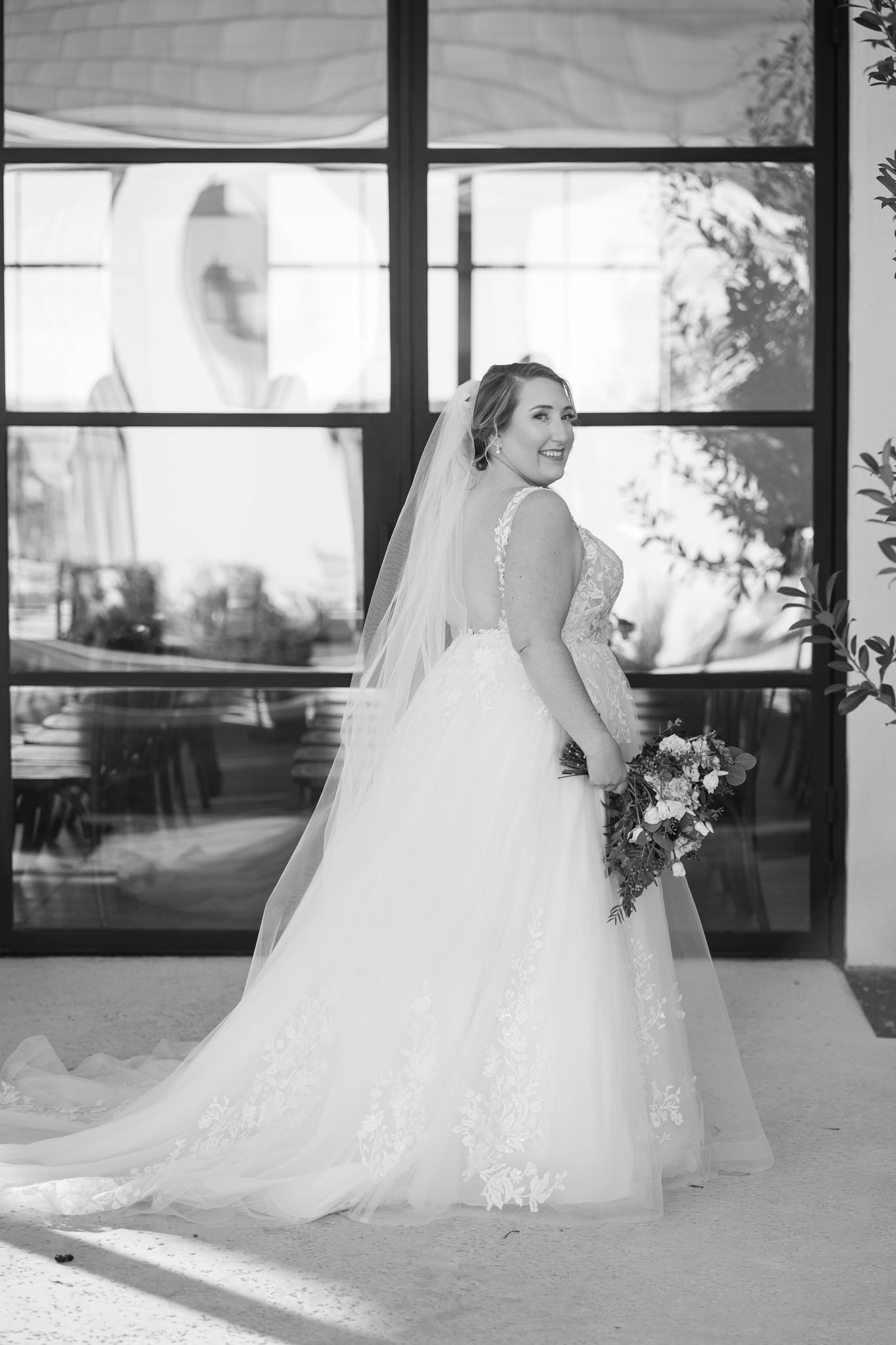 Newlywed bride in an wedding dress and a veil at The Arlo in Ausitn TX The Amber Studio