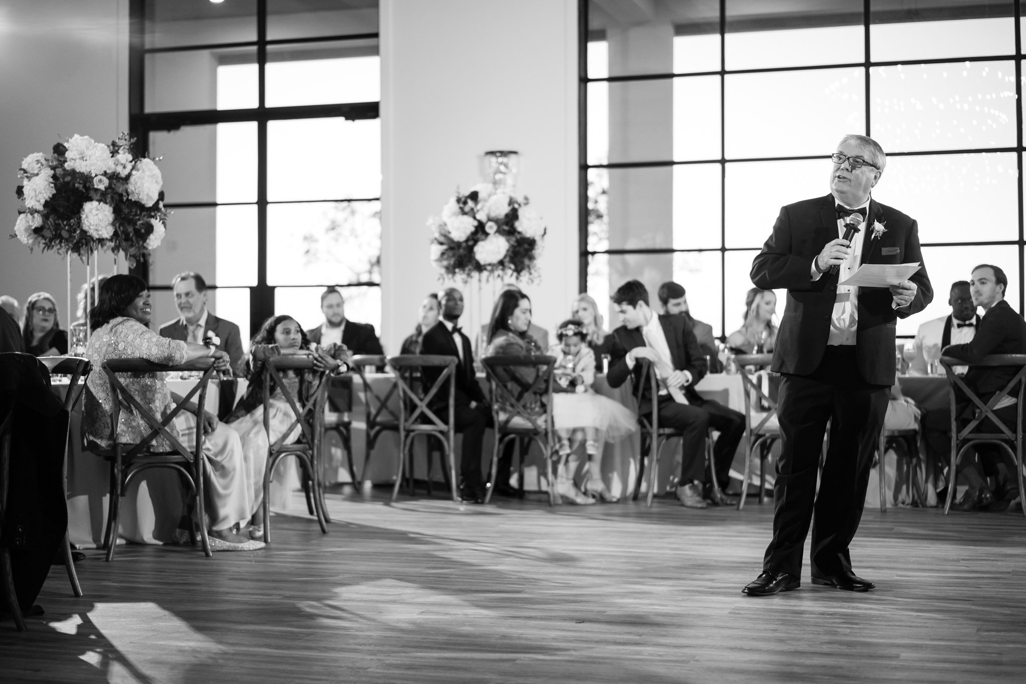 Father of the bride gives a speech at the wedding reception at The Arlo Austin TX The Amber Studio