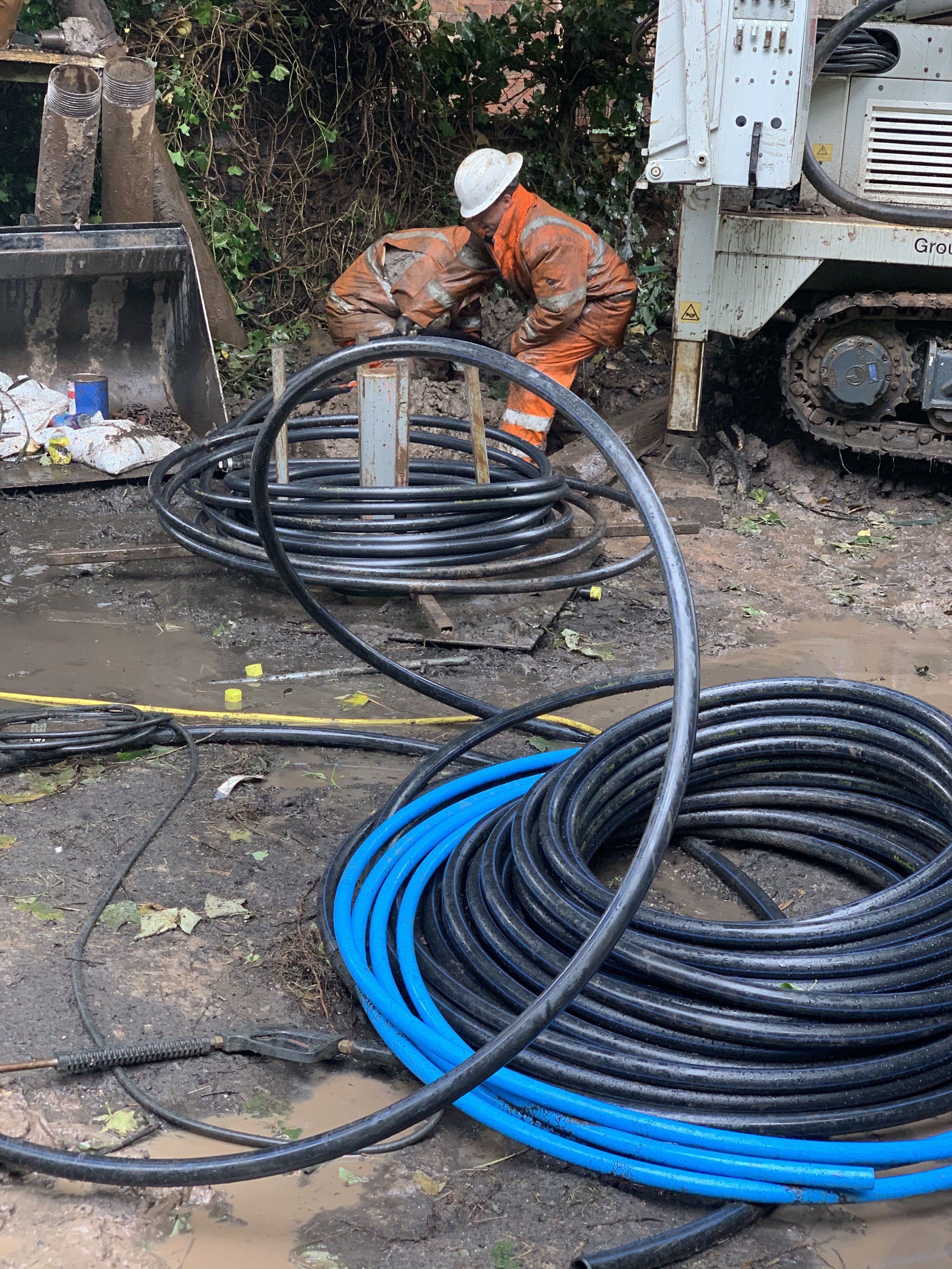Ground source heat pump - installing the pipes into the boreholes