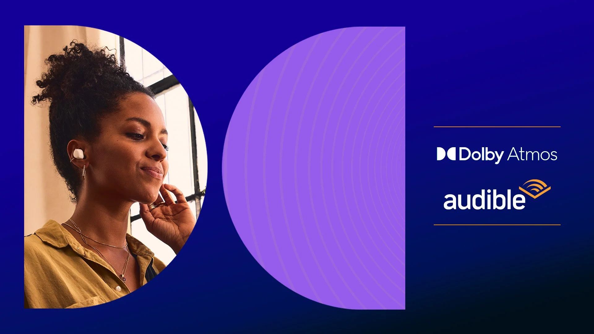 A woman wearing wireless earbuds, standing next to a window with blinds, smiling with her eyes closed, with logos for Dolby Atmos and Audible on a dark blue background.