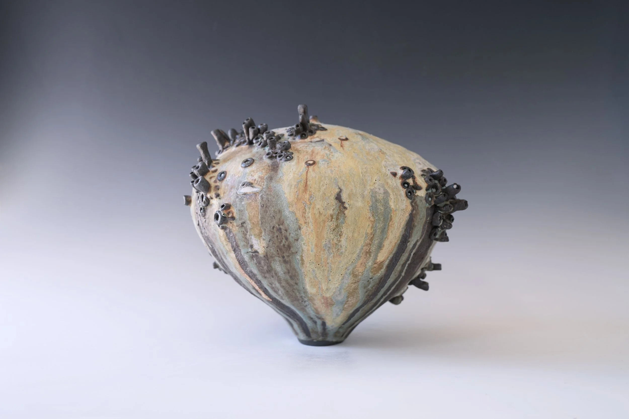 handmade ceramic vase inspired by natural landscapes