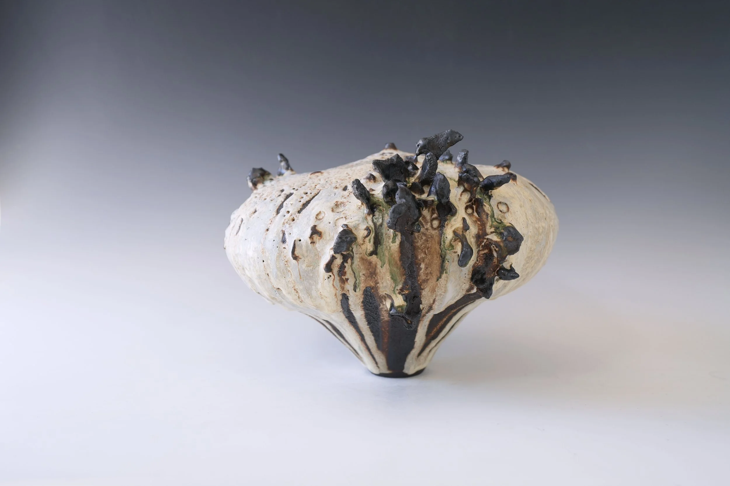 contemporary ceramic moon jar with textured glaze