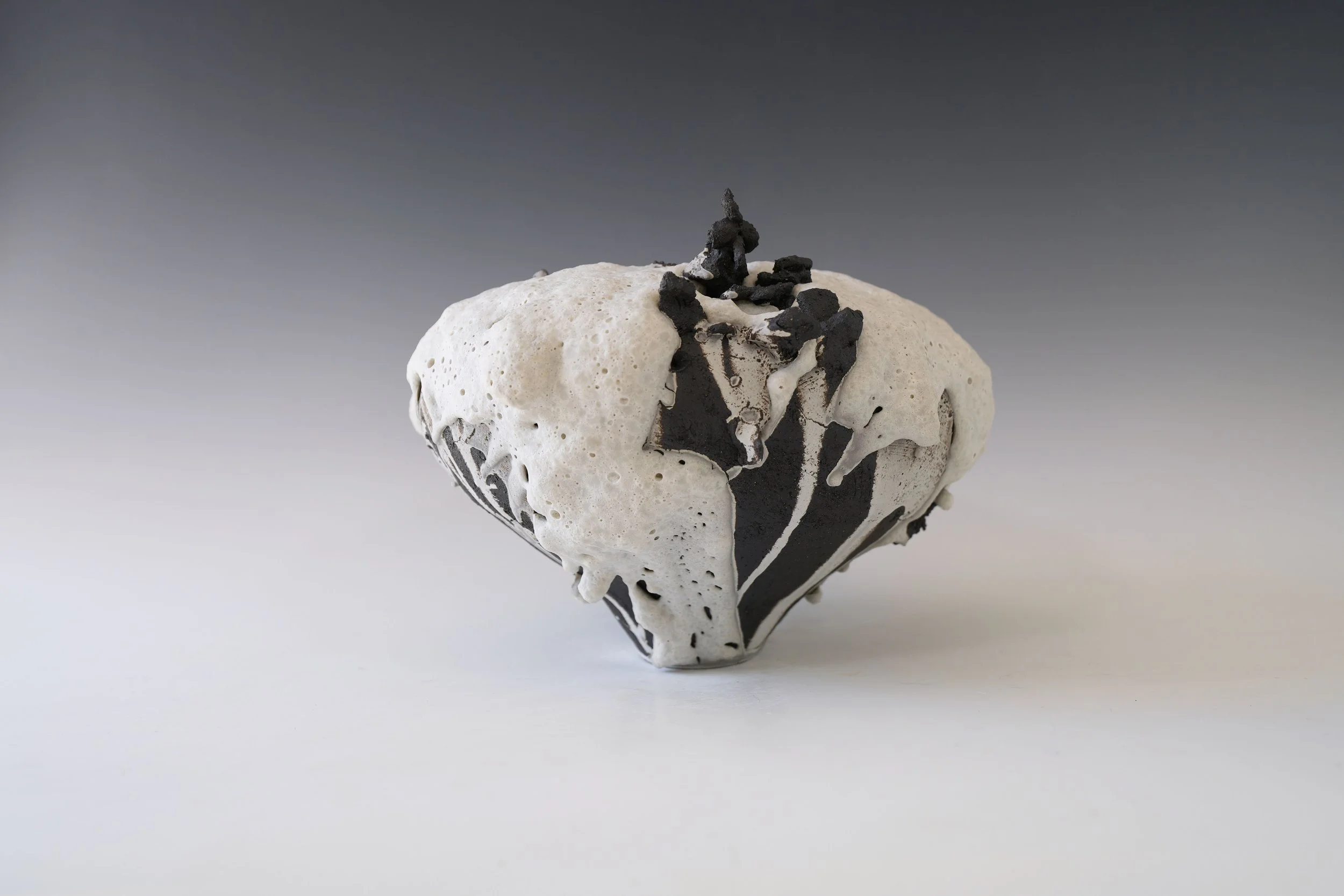 handmade sculptural ceramic vase with organic texture