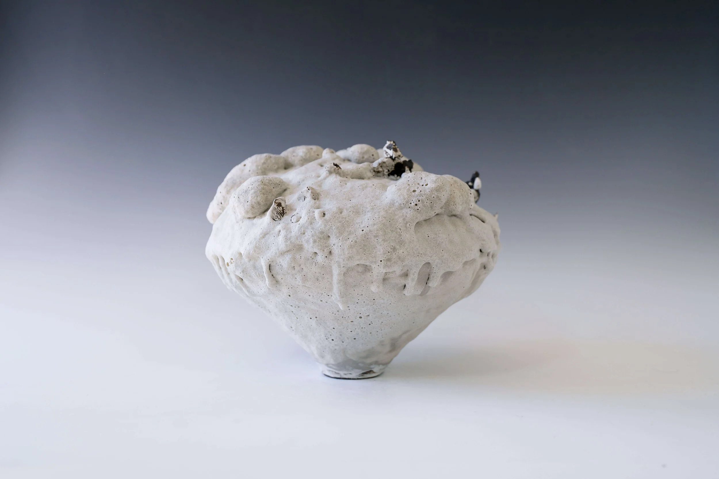 modern handmade ceramic vessel with natural glaze finish