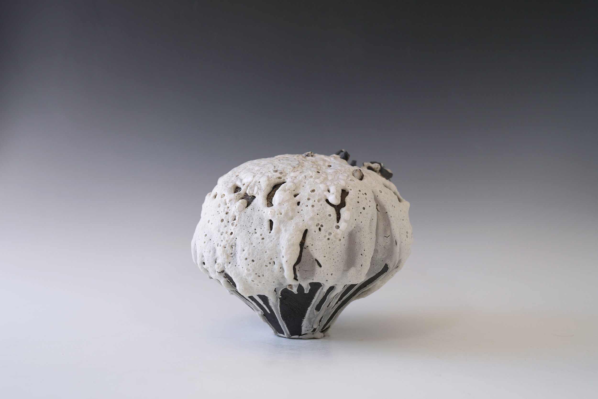 handcrafted ceramic moon jar with natural texture