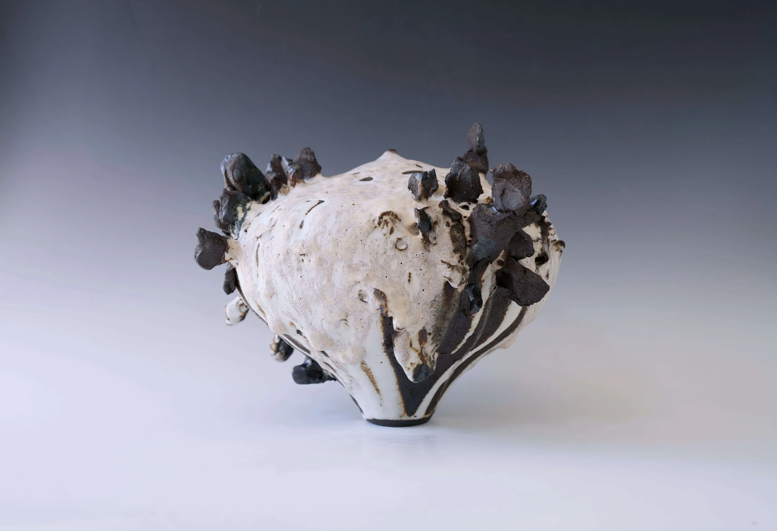 handcrafted ceramic moon jar with natural texture