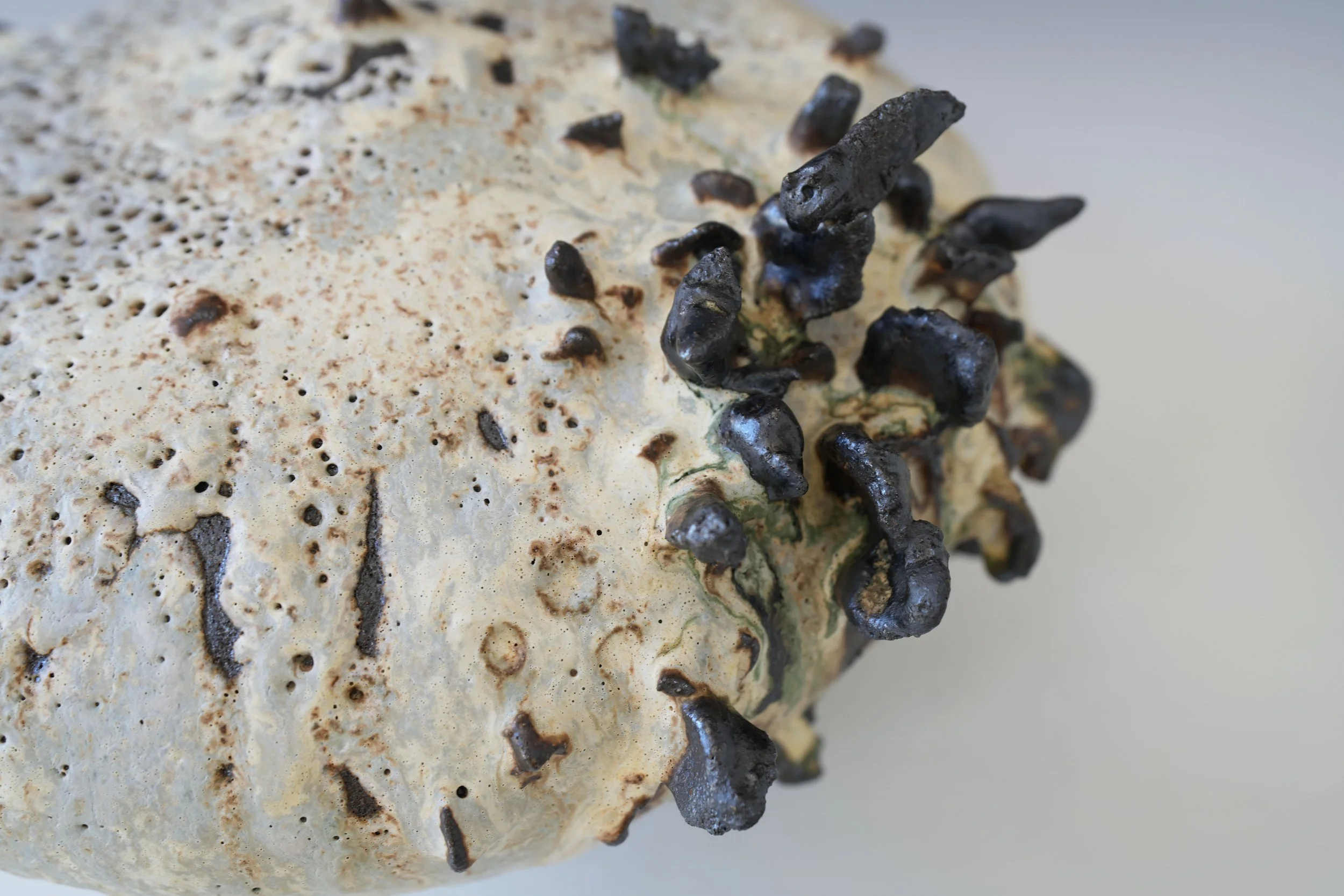 modern ceramic art vase with crater texture