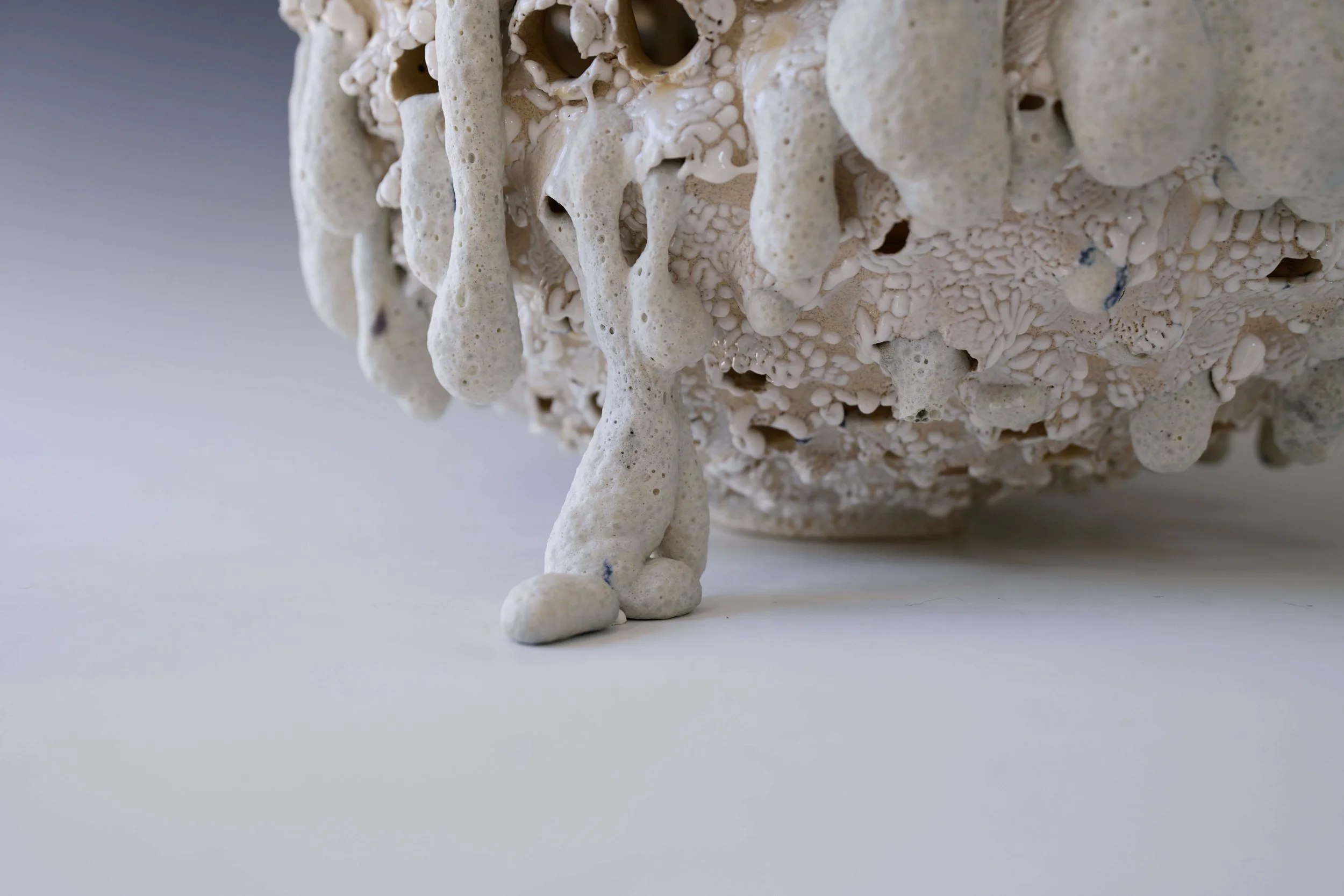 organic textured ceramic vase inspired by lunar landscape