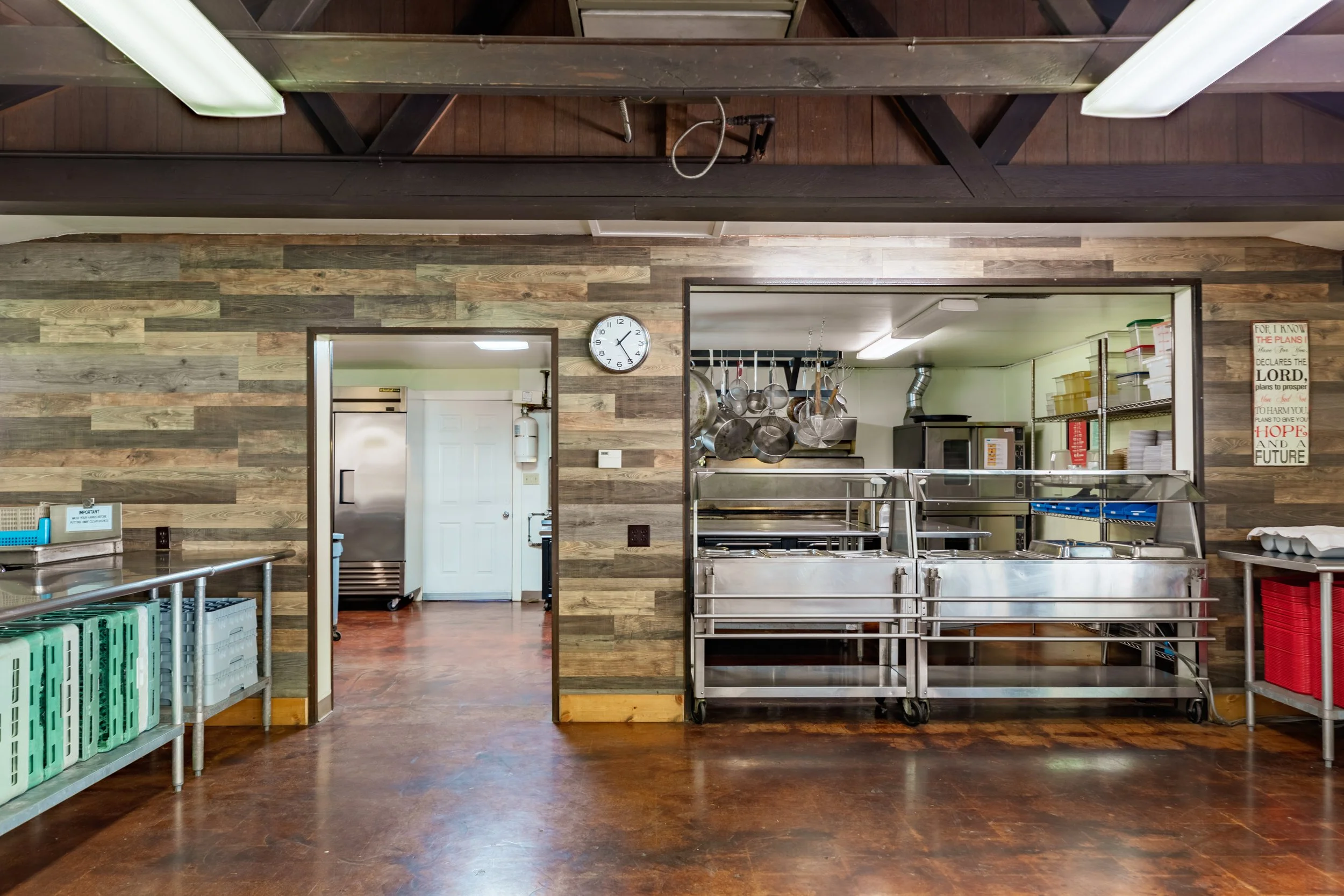 The service area of the kitchen, complete with a buffet station with glass guards.