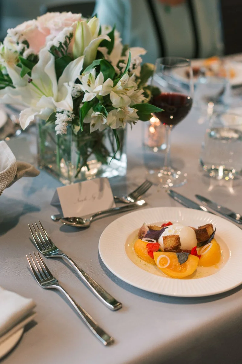 Plated wedding dinner with florals and candlelight at small wedding venues in NJ.