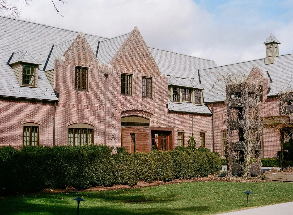 A charming brick estate exudes timeless elegance, offering a private and picturesque micro wedding venue in NJ & NYC for couples dreaming of a classic, storybook setting.