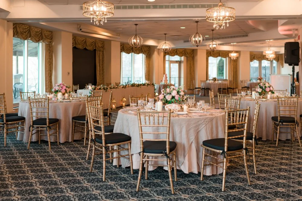 Elegant tablescapes with golden chairs and soft lighting set the scene for a sophisticated micro wedding venue in NJ & NYC, perfect for intimate celebrations filled with romance.