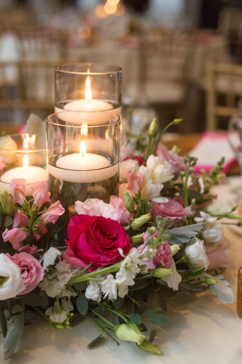 Soft candlelight and floral centerpiece, capturing how to plan a small wedding with romantic detail