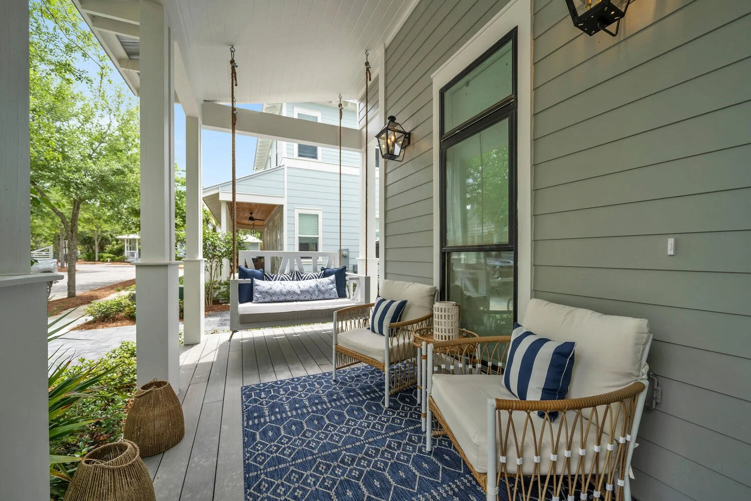 Calming Front Patio with Porch Swing and Additional Seating