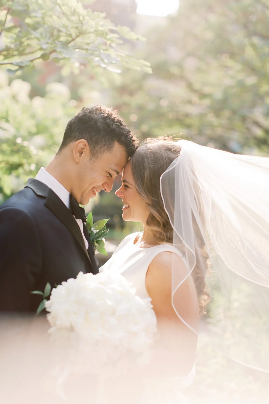 Bride and groom pose at Philadelphia wedding