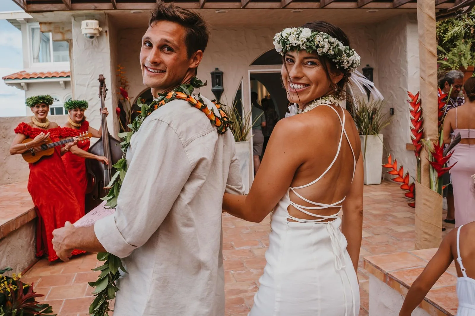 Newlyweds smile during destination wedding in Hawaii