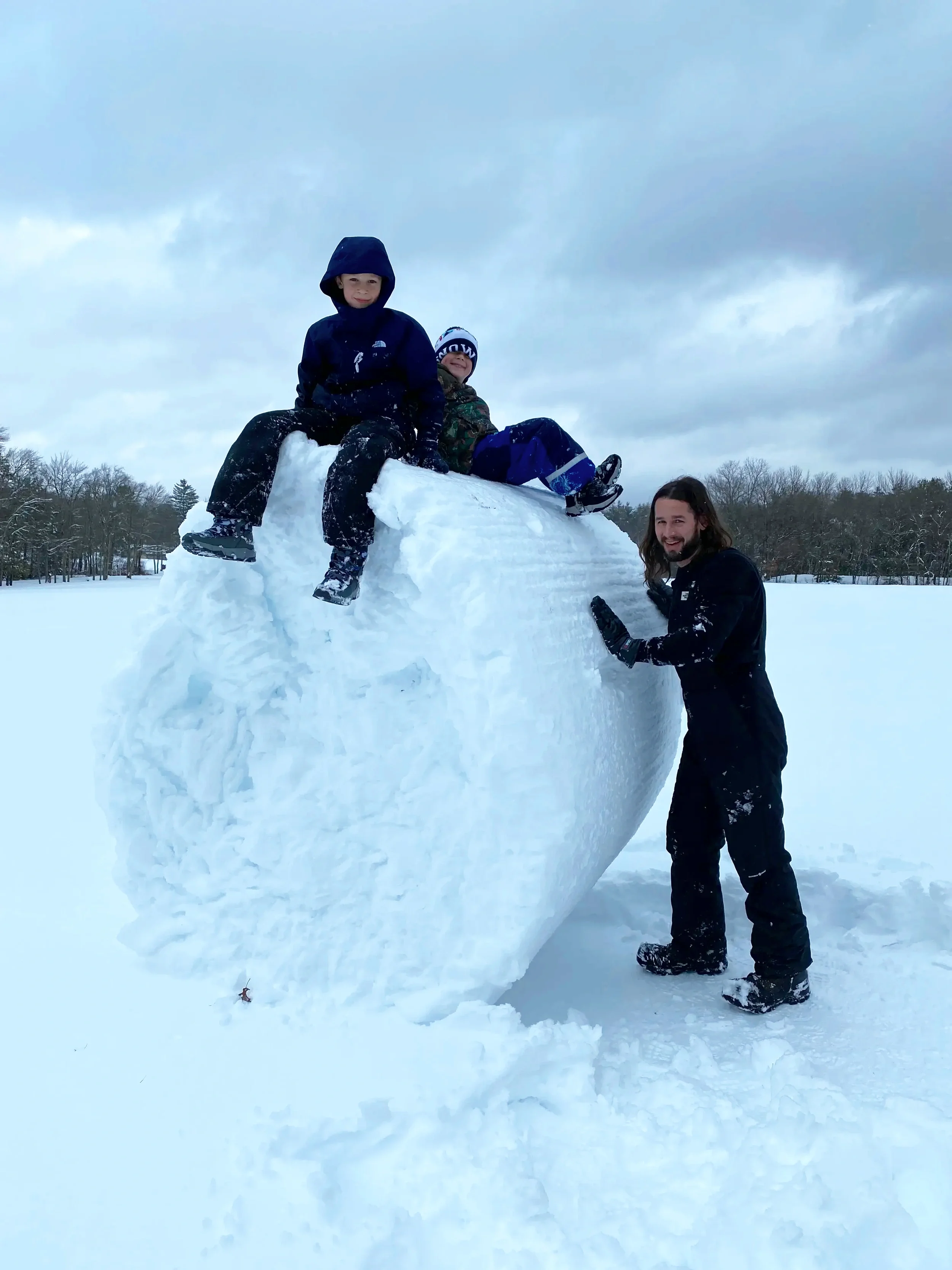 Family enjoying winter activities at Mountain Springs Lake Resort