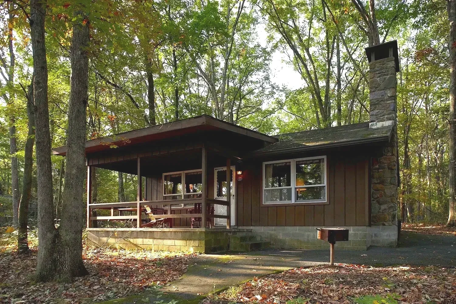 Lakeview Cabin 37 lakefront exterior with covered porch at Mountain Springs Lake Resort