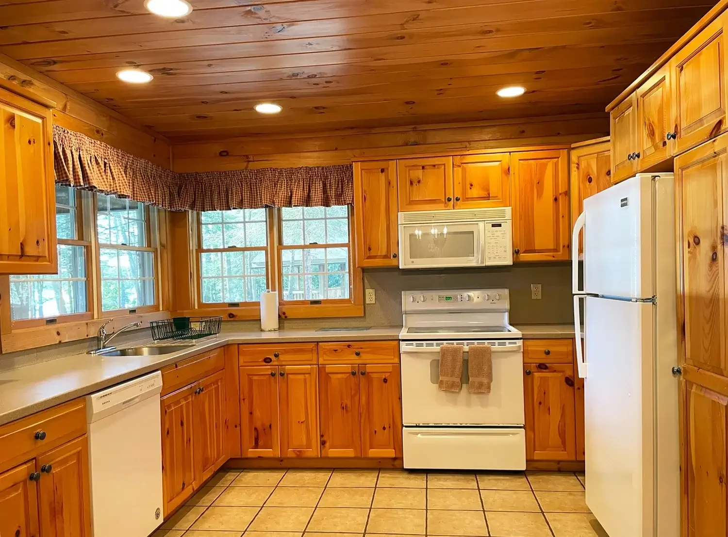 Full kitchen inside a family cabin at Mountain Springs Lake Resort