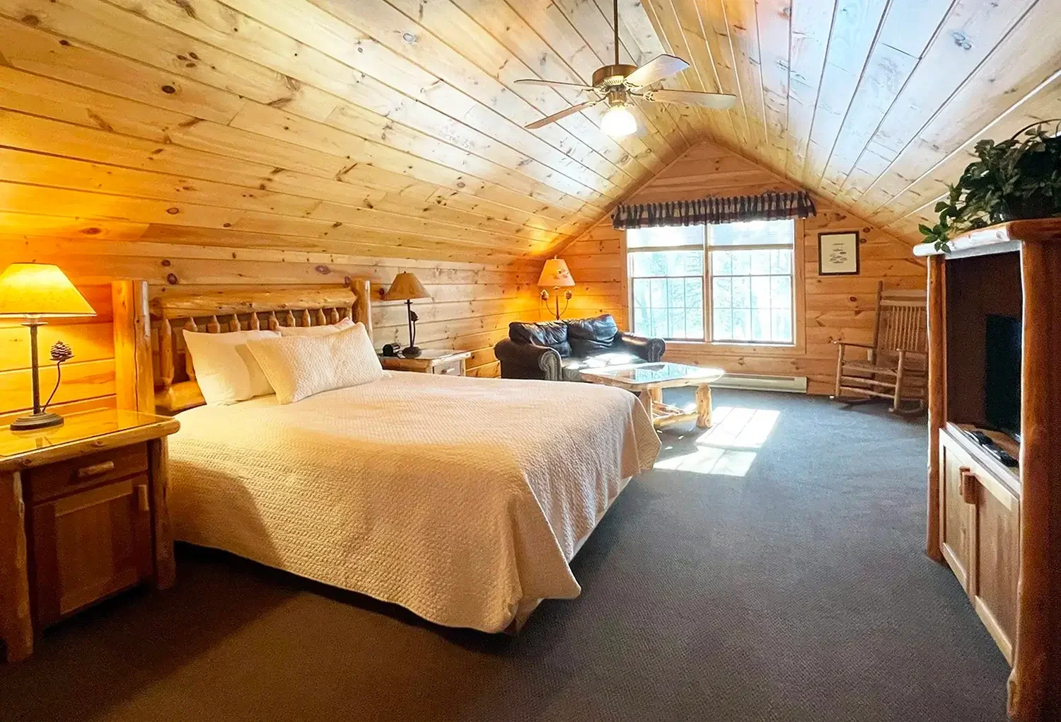 Warm and cozy cabin bedroom at Mountain Springs Lake Resort during winter