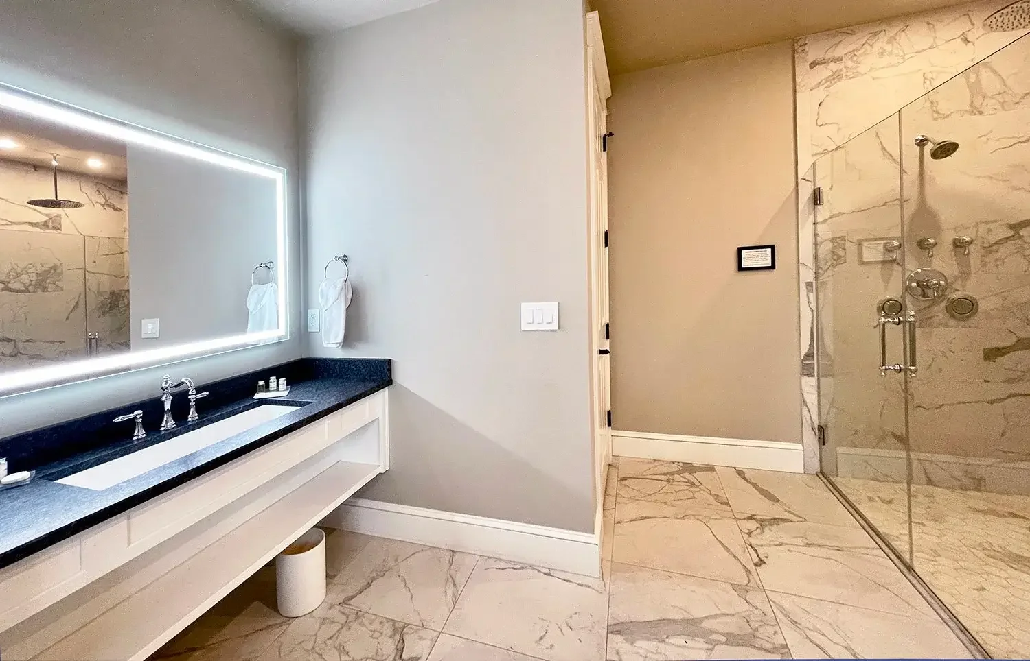Luxury suite bathroom with rain shower at Mountain Springs Lake Resort