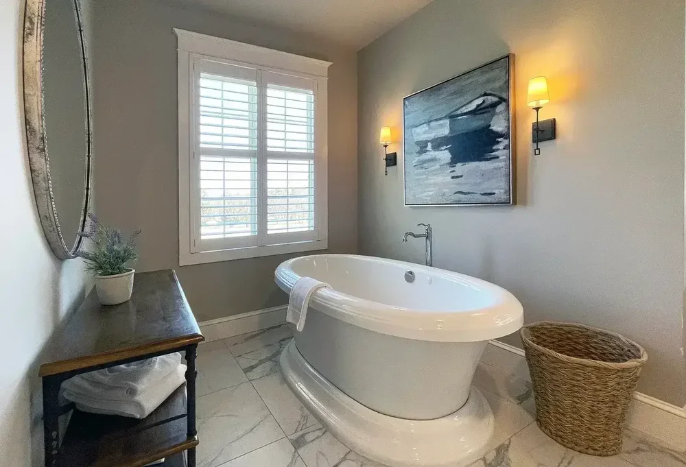 Modern luxury suite bathroom with freestanding tub at Mountain Springs Lake Resort