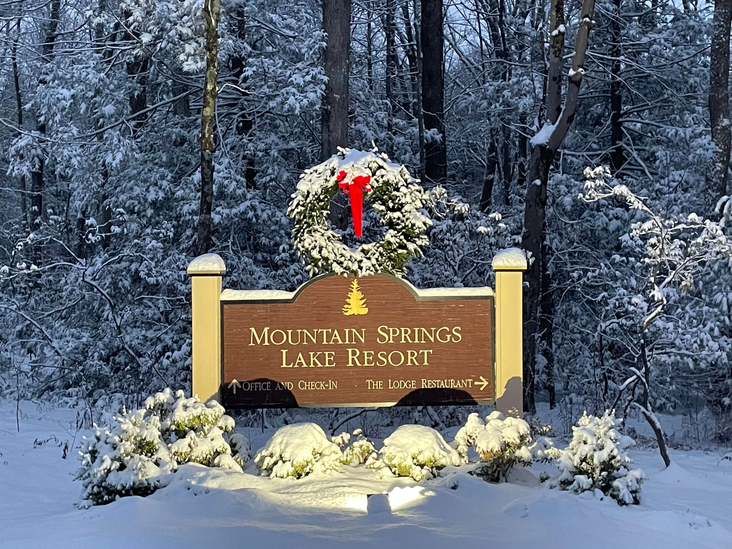 Mountain Springs Lake Resort entrance sign decorated for winter in the Pocono Mountains
