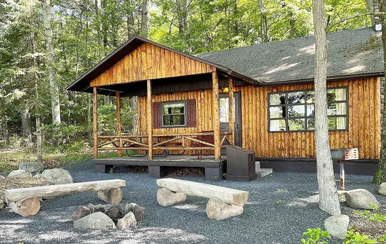 Lakeview Cabin 16 lakefront exterior with fire pit seating at Mountain Springs Lake Resort
