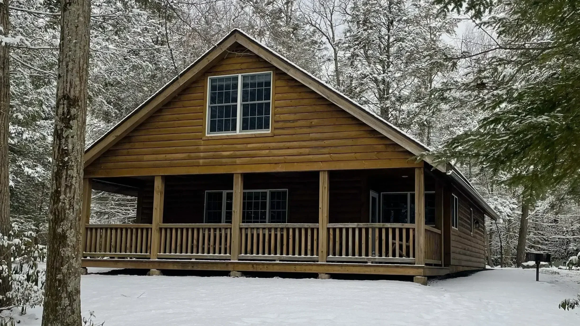 Large snowy cabin at Mountain Springs Lake Resort in the Pocono Mountains