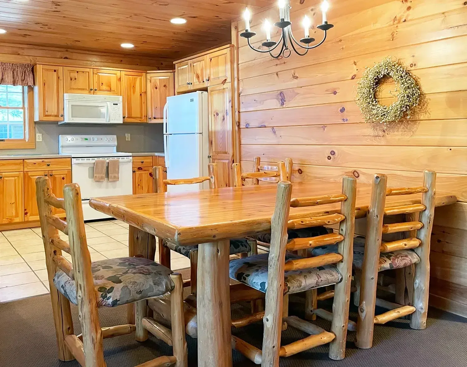 Cabin dining room and kitchen at Mountain Springs Lake Resort
