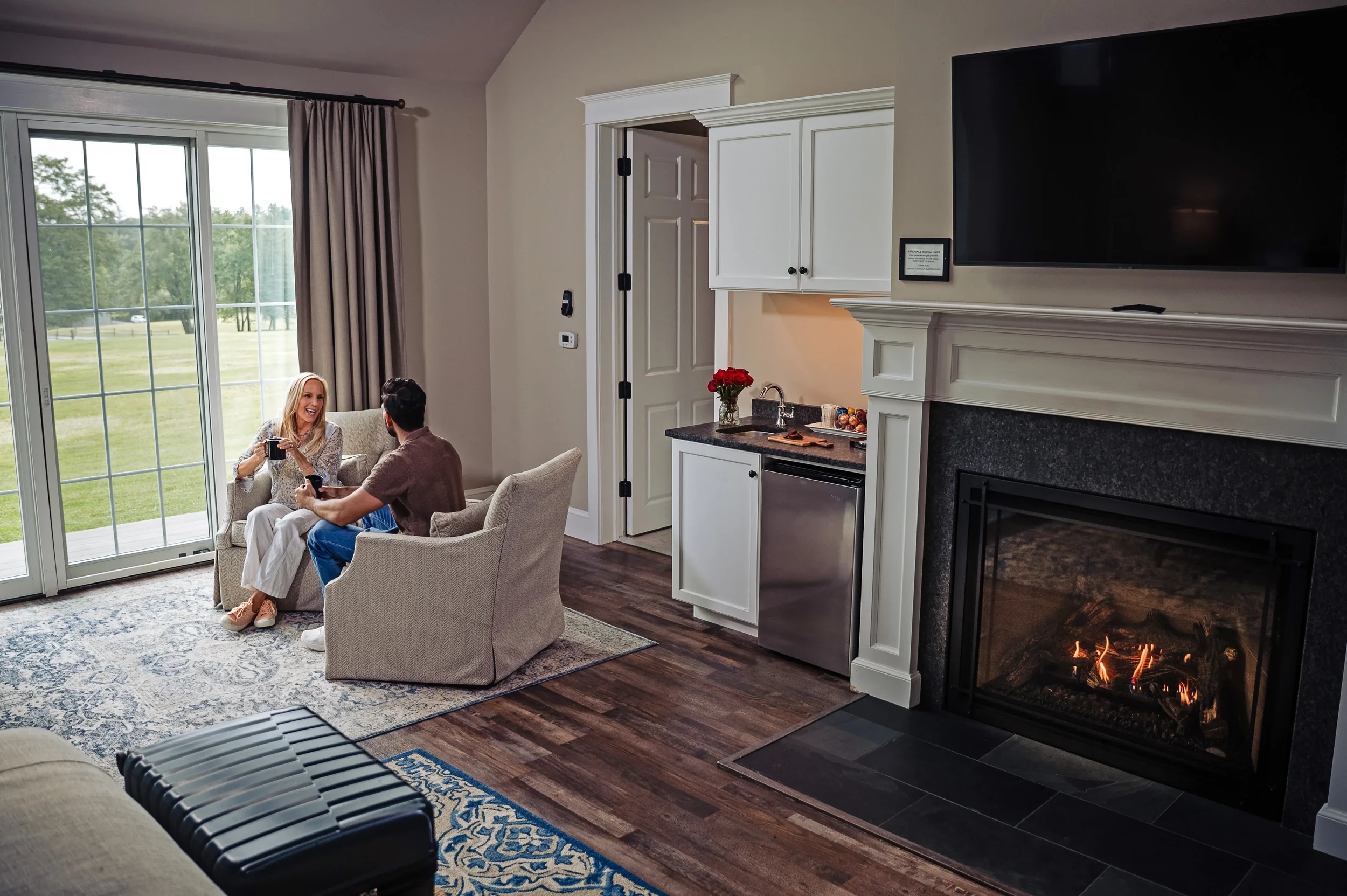 Couple relaxing in a luxury suite at Mountain Springs Lake Resort