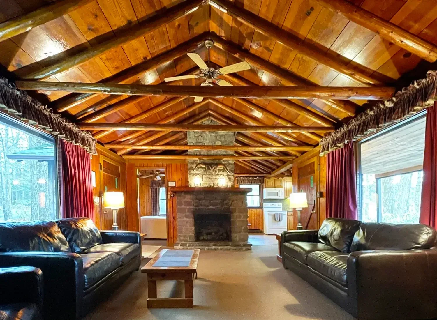 Cabin living room with fireplace at Mountain Springs Lake Resort