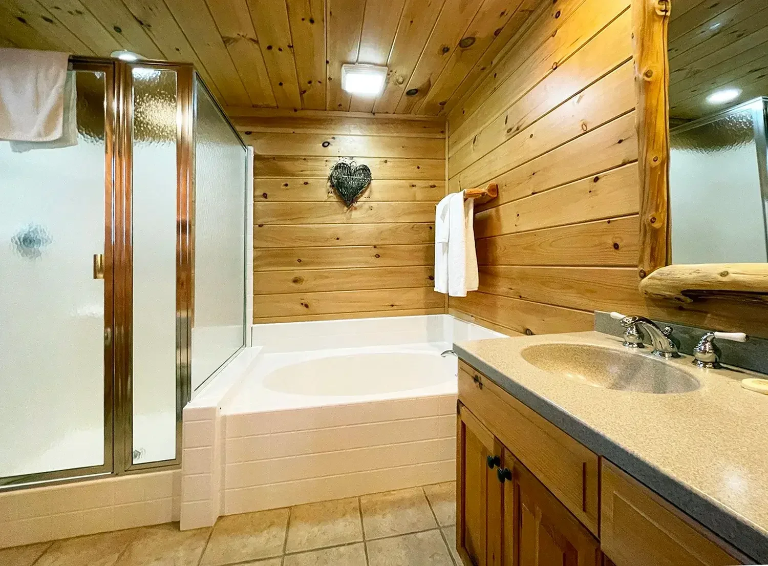 Hemlock Cabin #63 – Bathroom with Tub and Shower (Main Floor)