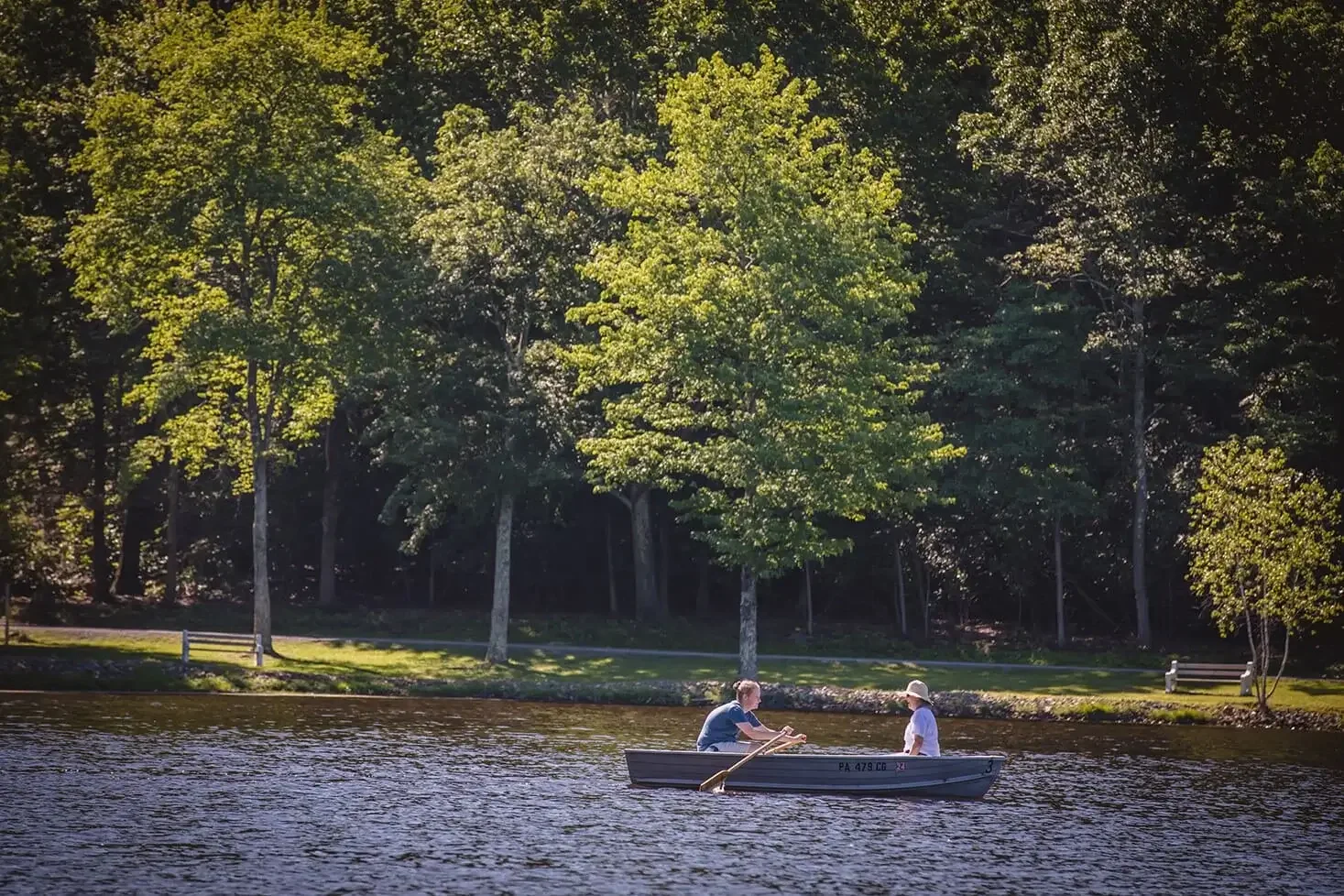 Couple rowing on lake at Mountain Springs Lake Resort