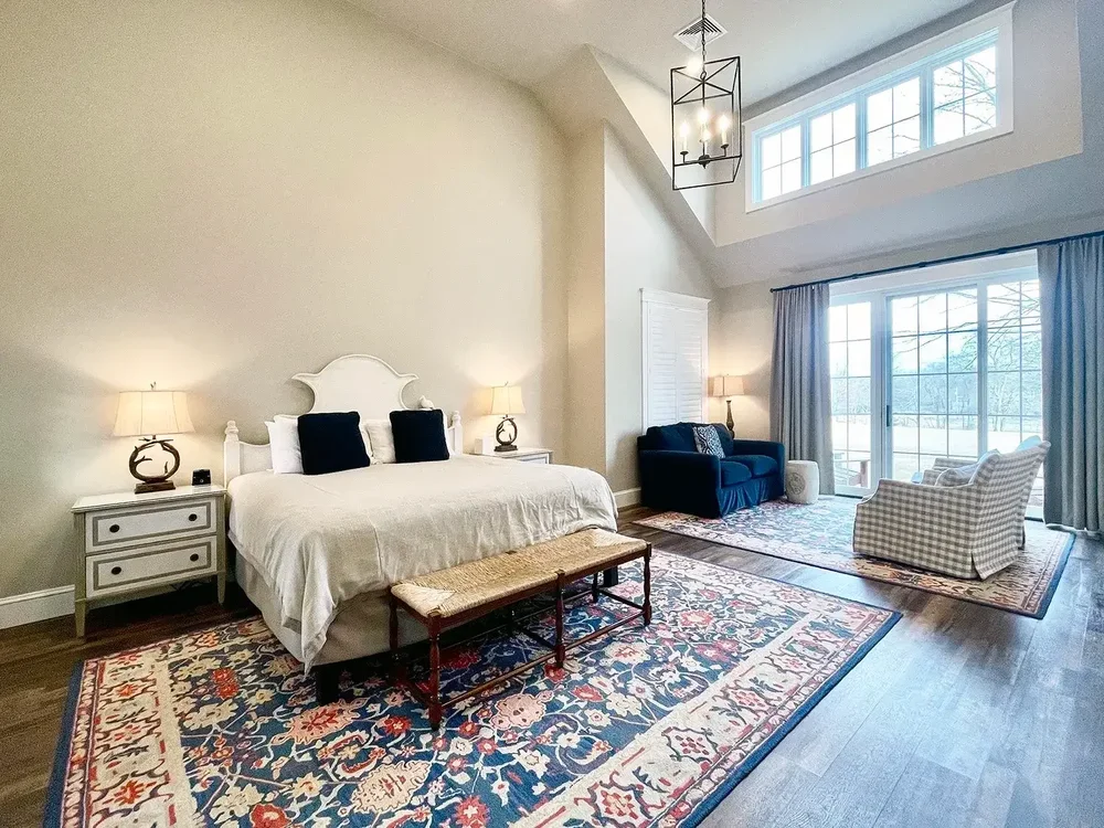 Hill Suite 9 king bed, sitting area, and vaulted ceiling