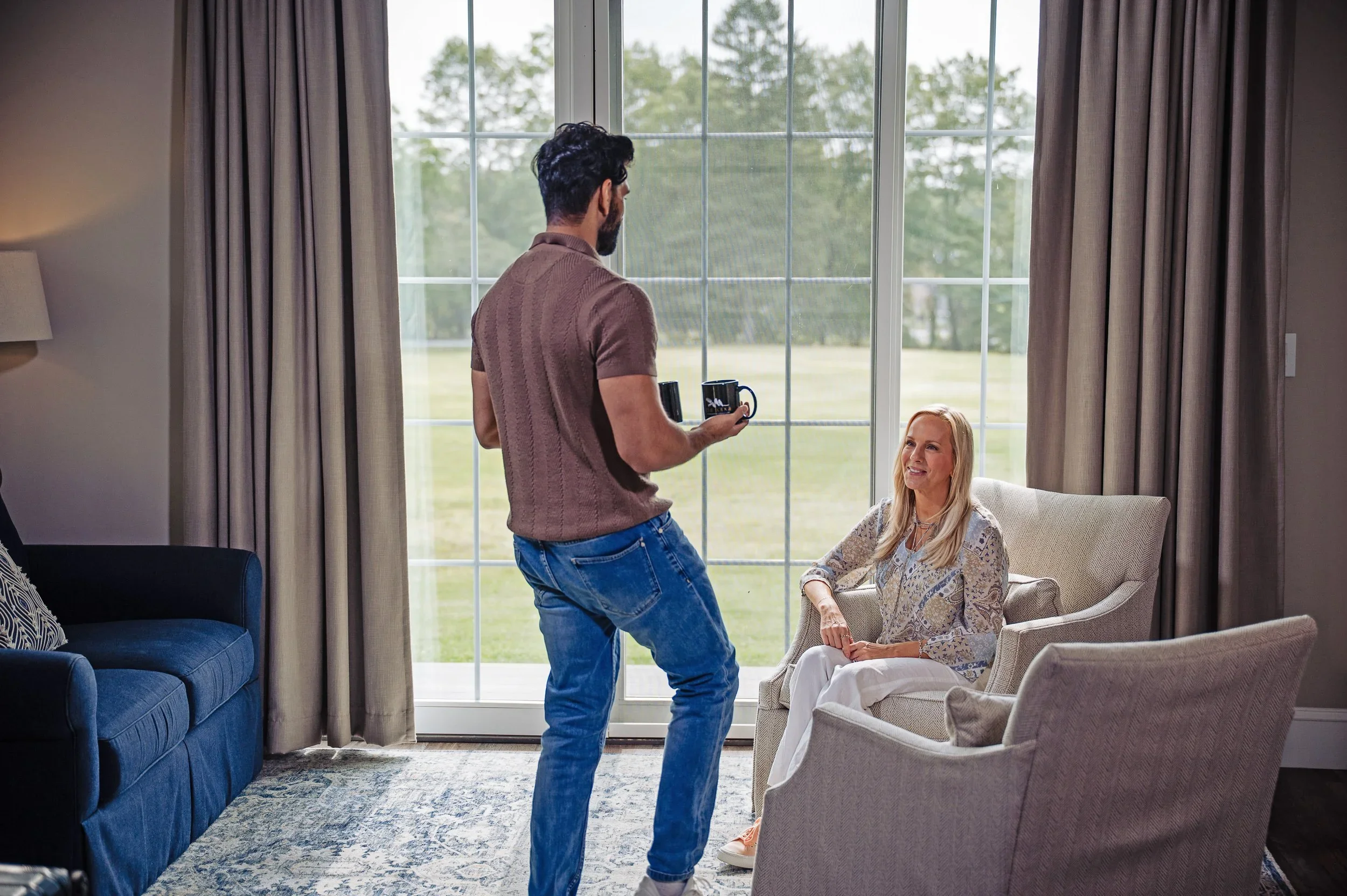 Couple relaxing in a luxury suite at Mountain Springs Lake Resort