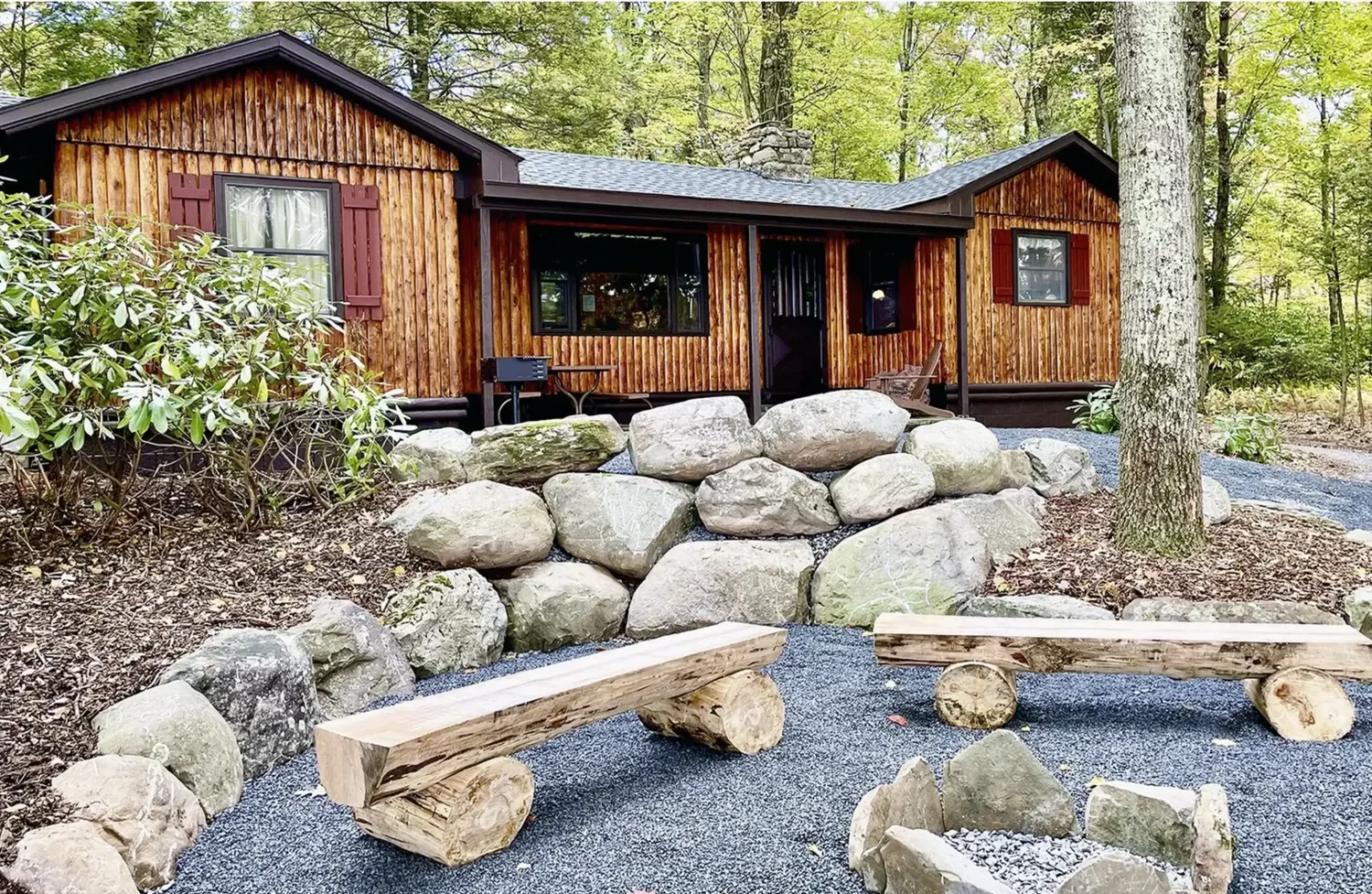 Woodland cabin at Mountain Springs Lake Resort during the green summer season