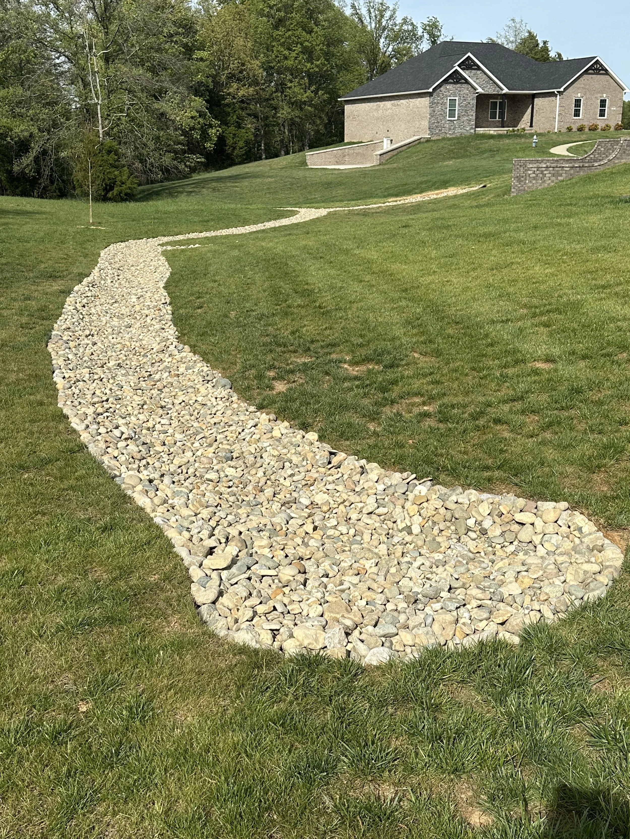 landscaping methods that can help mitigate flooding and protect your home against water damage Brandenburg, Radcliff and Elizabethtown, Kentucky