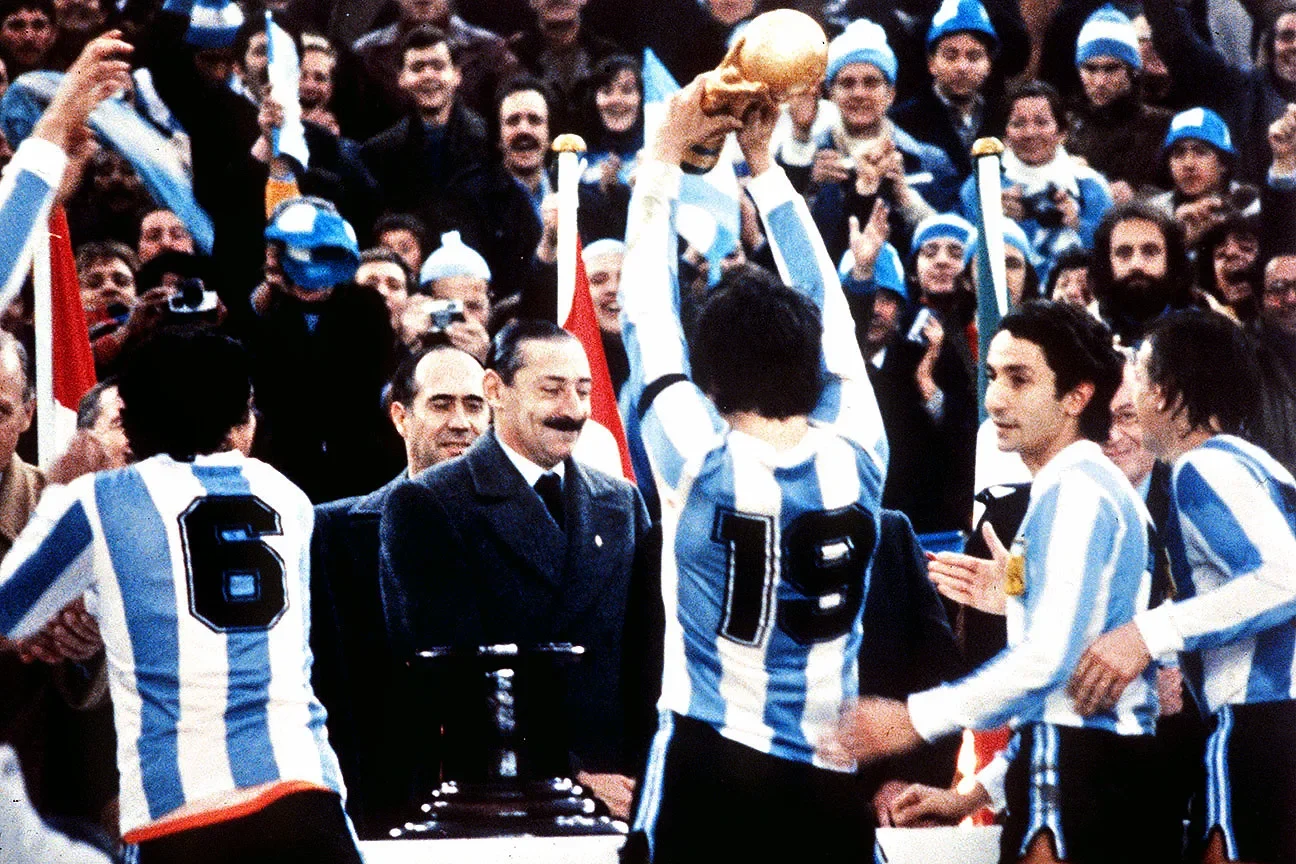 Lieutenant General Jorge Rafael Videla and his iconic mustache approve of Argentina's victory in the 1978 World Cup.