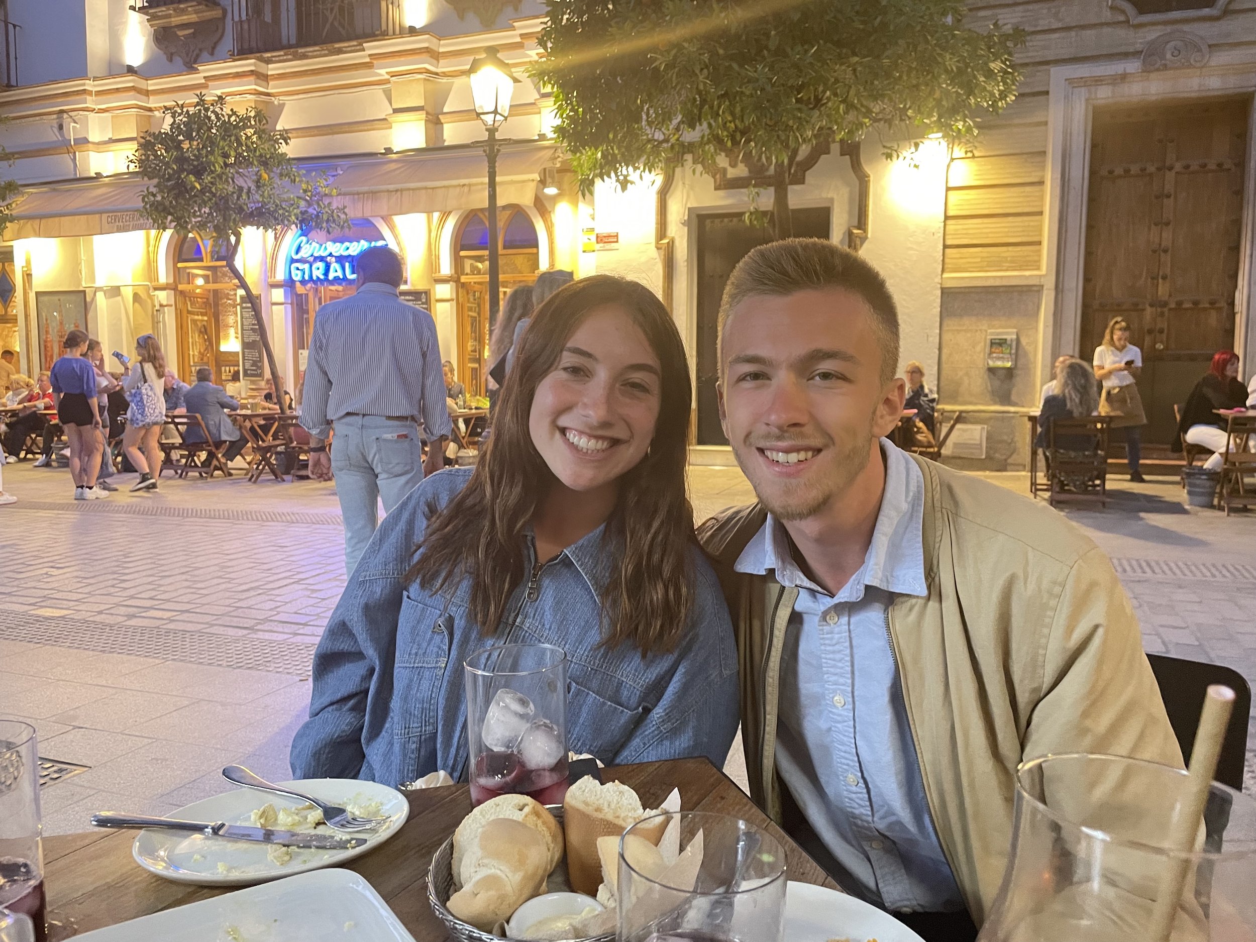 Lexie and I eating tapas and drinking *a lot of sangria* in Seville with my family