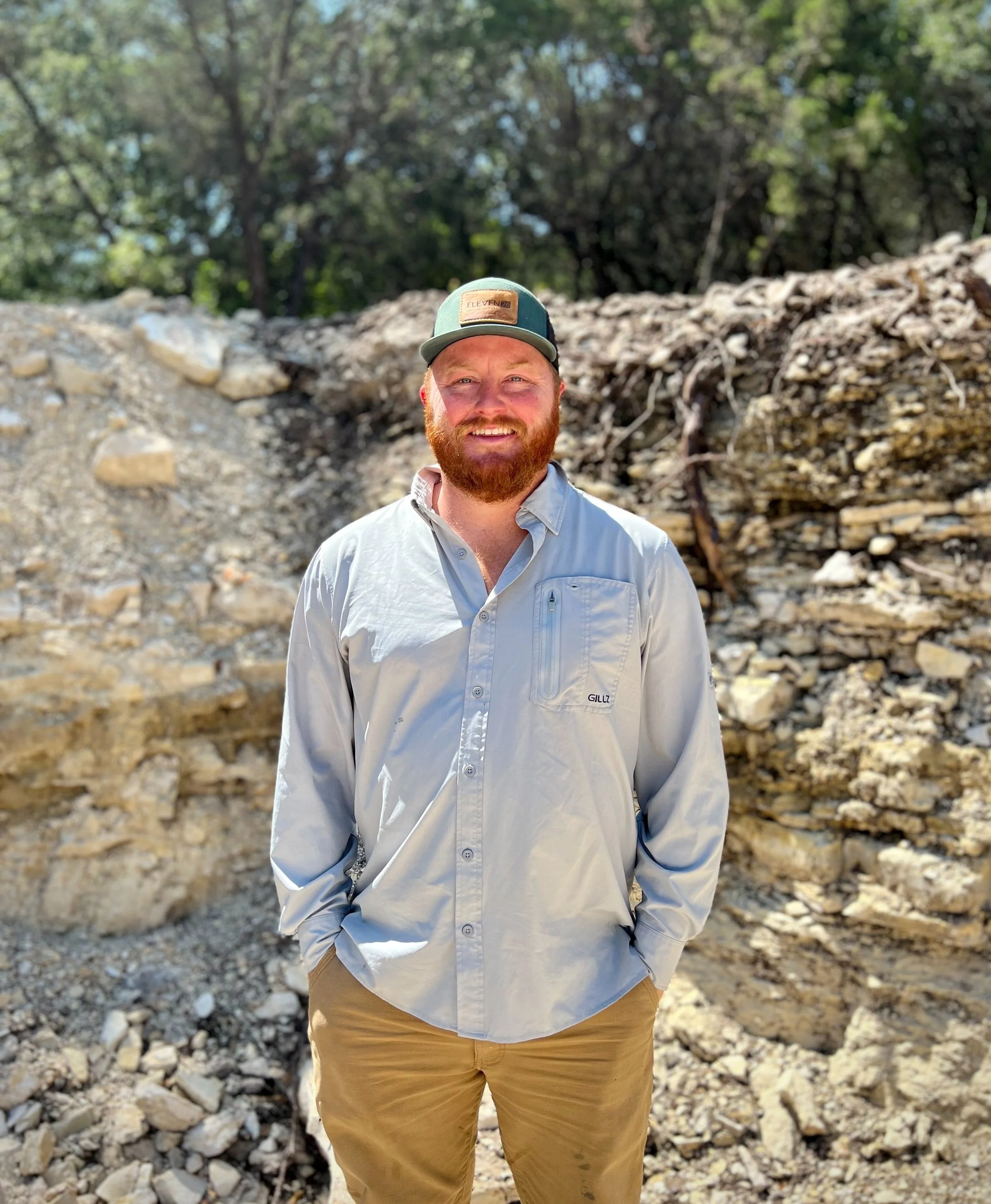 owner stands at job site